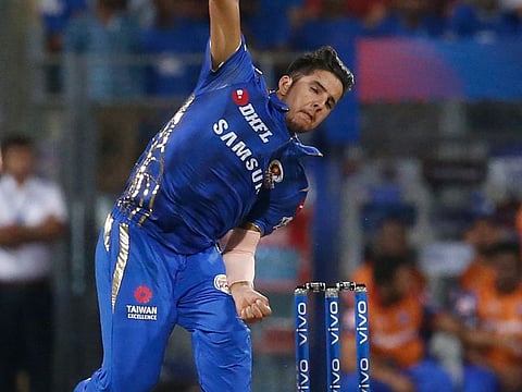 Mumbai Indians' Rasikh Salam bowls during the VIVO IPL T20 cricket match against Delhi Capitals in Mumbai, on Sunday, March 24, 2019.