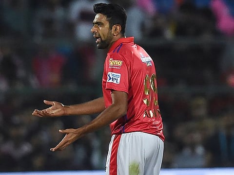 Kings XI Punjab's Ravichandran Ashwin reacts after dismissing Rajasthan Royals' Jos Buttler at the Sawai Mansingh stadium in Jaipur on March 25, 2019.