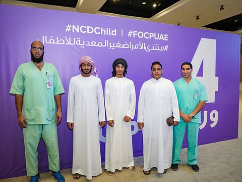 Matar (second from left) quit smoking and inspired his peers positively and Abdullah Mohammad Al Marzouqi (fourth from left) who had reversed his Type II diabetes by reducing  weight with good diet and exercise.