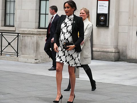 the Duchess of Sussex, leaving King's College after joining a panel discussion to mark International Women's Day in London.