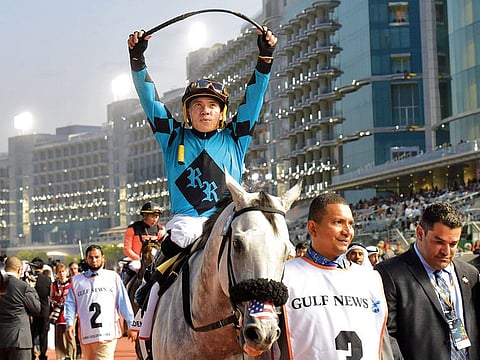 Emisael Jaramillo celebrates after guiding XY Jet to win the Dubai Golden Shaheen.
