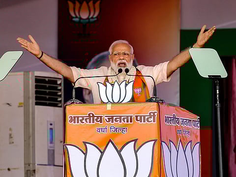 Wardha: Prime Minister Narendra Modi gestures as he speaks during an election rally, ahead of the Lok Sabha polls, in Wardha, Monday, April 01, 2019.
