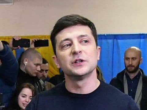 Ukrainian comedian and presidential candidate Volodymyr Zelensky casts his ballot at a polling station during Ukraine’s presidential election in Kiev on March 31.