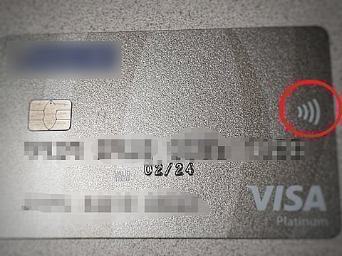 Check if your card has this: If your debit or credit card has this sign (encircled), it will allow 'tap and go' payment. This is known as a contactless card