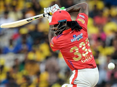 Kings XI Punjab cricketer Chris Gayle plays a shot during the IPL match againstChennai Super Kings at the M.A. Chidambaram Stadium in Chennai on April 06, 2019.