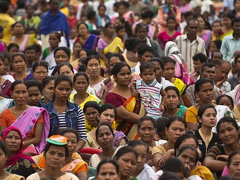 Supporters attend an election rally of Bharatiya Janata Party ahead of general elections in Borhola village in Jorhat, Assam, India, Tuesday, April 2, 2019.