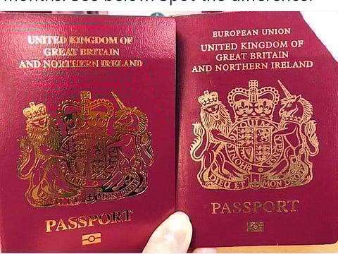 The new UK passport (left) is held next to the one printed in the old format. Both passports have burgundy covers. But on one, the words “European Union” are missing from the top.