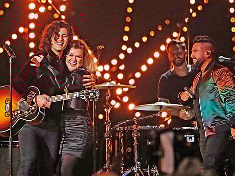 Dan Smyers and Shay Mooney of Dan + Shay perform ‘Keeping Score’ with Kelly Clarkson.