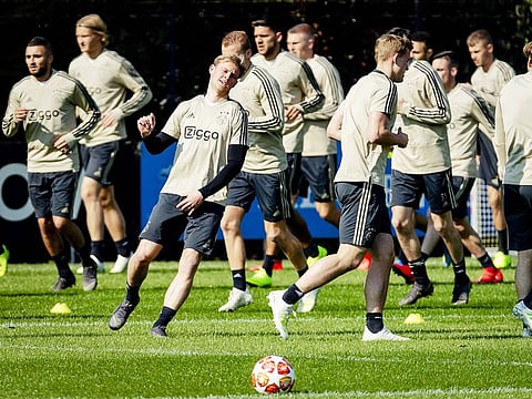 Ajax Amsterdam players take part in a training session on the eve of the team's European Champions league quarter final match against Juvventus, at Sports park De Toekomst in Amsterdam.