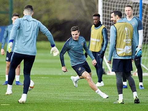 Chelsea players seen during training at Cobham, Britain, on Wednesday.
