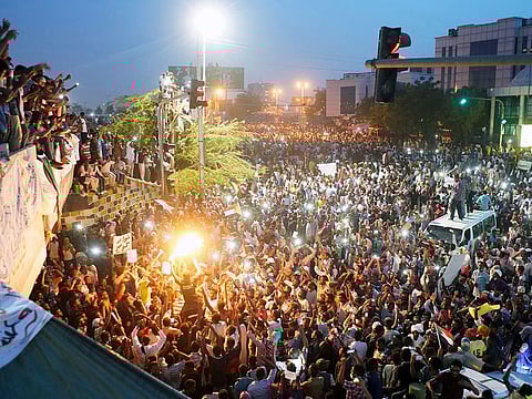 Demonstrators attend a protest rally demanding Sudanese President Omar Al-Bashir to step down outside Defence Ministry in Khartoum, Sudan.