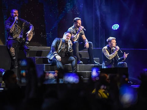 The Boyzone performs at the Dubai Duty Free Tennis Stadium.