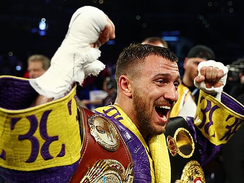 Vasiliy Lomachenko celebrates defending his WBA/WBO lightweight titles after knocking out Anthony Crolla at Staples Center on April 12, 2019 in Los Angeles, California.