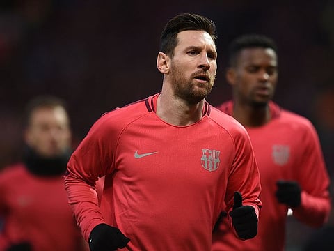 Barcelona's Lionel Messi trains.