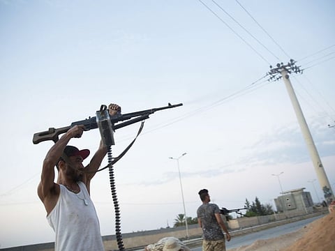 This Sept. 21, 2018 file photo, shows fighters under the UN-backed government on the front lines during clashes in southern Tripoli.