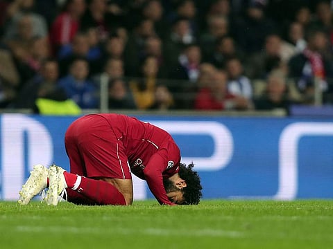 Liverpool's Mohammad Salah celebrates after scoring his side's second goal.
