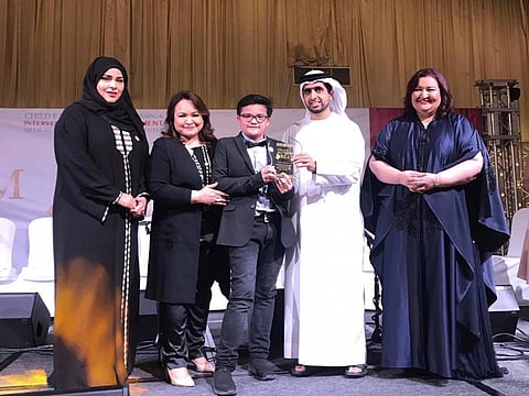 Meet Laurence Anthony De Guzman. The 14-year-old Filipino based in the UAE is the Emirates Autism Awareness Ambassador. From left: Chairperson Emirates Autism Society Alia Shehhi, Mylene De Guzman, Laurence De Guzman, Shaikh Mohammad Bin Maktoum Bin Juma Al Maktoum and Dr Hiba Shata, Managing Director and Co-Founder Child Early Intervention Medical Centre in Dubai.