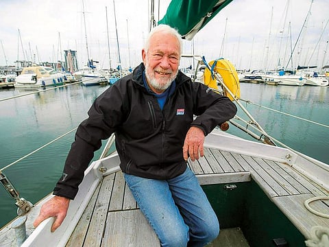 Sir Robin Knox-Johnston at the deck of his boat Suhaili in Gosport, England.