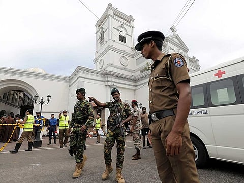 Sri Lankan military officials stand guard in front of the St. Anthony's Shrine, Kochchikade church after an explosion in Colombo, Sri Lanka April 21, 2019.