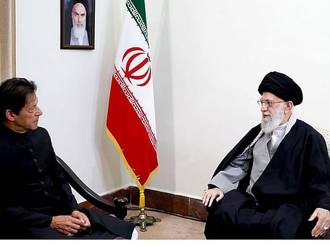 This handout picture provided by the office of Iran's Supreme Leader Ayatollah Ali Khamenei on April 22, 2019 shows him (1st-R) meeting with Pakistani Prime Minister Imran Khan (L) in the Iranian capital Tehran