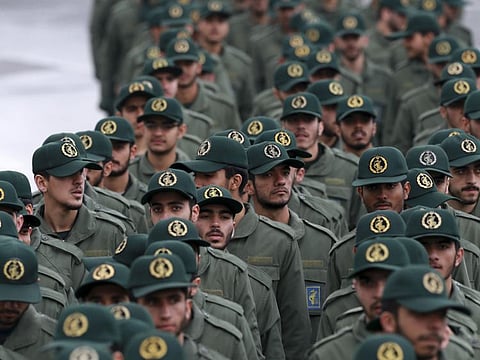 In this Feb, 11, 2019 file photo, Iranian Revolutionary Guard members arrive for a ceremony celebrating the 40th anniversary of the Islamic Revolution, at the Azadi, or Freedom, Square, in Tehran, Iran.