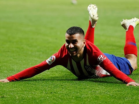 Atletico Madrid's Angel Correa celebrates scoring their third goal.