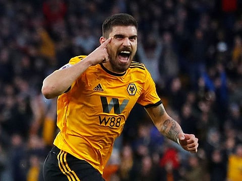 Ruben Neves celebrates scoring Wolves' opener.