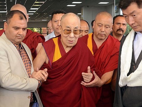 Tibetan spiritual leader the Dalai Lama arrives at the Kangra airport on the outskirts of the northern hilltown of Dharamsala, India.