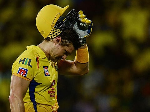 Chennai Super Kings cricketer Shane watson removes his helmet as he walk back to pavillion after loosing his wicket during the 2019 Indian Premier League (IPL) Twenty20 cricket match between Chennai Super Kings and Sunrisers Hyderabad.