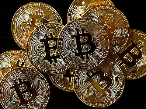 A collection of Bitcoin (virtual currency) tokens are displayed in this picture illustration.