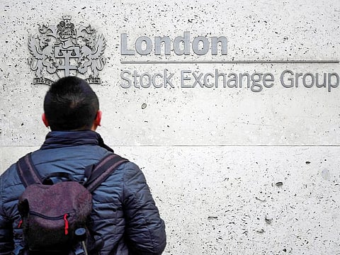 The London Stock Exchange. Six out of 24 economists in a survey expect at least one MPC member will call for an immediate tightening.