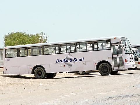 Drake & Scull construction company buses for labourers in Al Quoz.