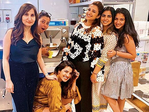 Priyanka Chopra (centre) with Parineeti Chopra (third from right) and Isha Ambani (second from right).