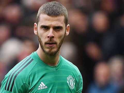 Manchester United's goalkeeper David de Gea leaves the pitch at half-time during the English Premier League football match against Chelsea at Old Trafford in Manchester, north west England, on April 28, 2019.