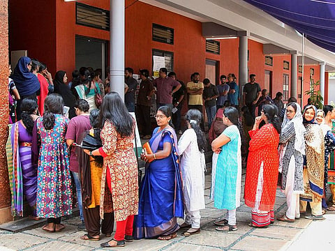 Women wait to cast their votes at a polling station during the third phase of the Lok Sabha polls in Kerala last year. With panchayat elections due in November, Twenty20 members say they are ready for an encore.
