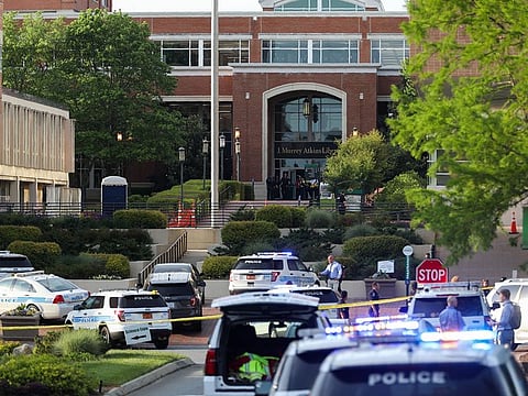 Police keep the campus on lockdown after a shooting at the University of North Carolina in University City, Charlotte, on April 30, 2019.
