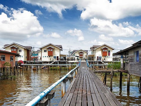 Brunei's Famed water villages are fully self sufficient with own mosques, schools, shops, piped water, electricity and satellite TV