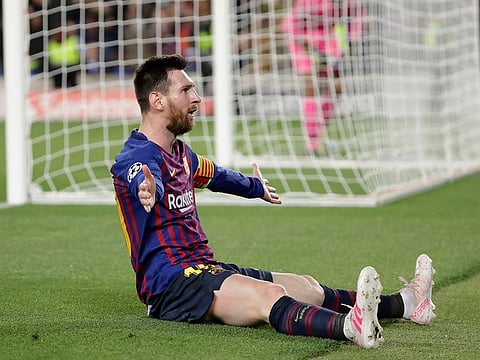 Barcelona's Lionel Messi celebrates after scoring his side's third goal.