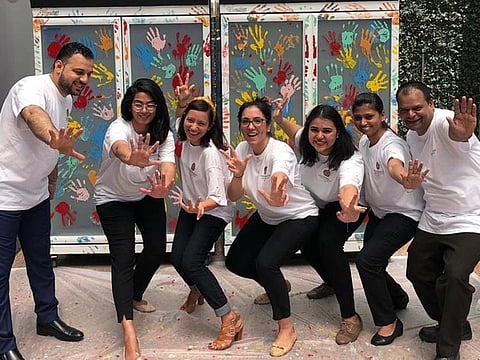 People were invited to put their colourful fingerprints on Ramadan Fridges in Business Bay