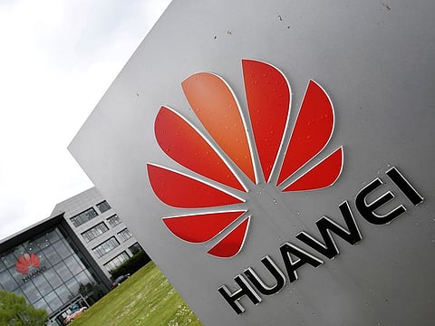 Signage is seen at the Huawei offices in Reading, Britain.