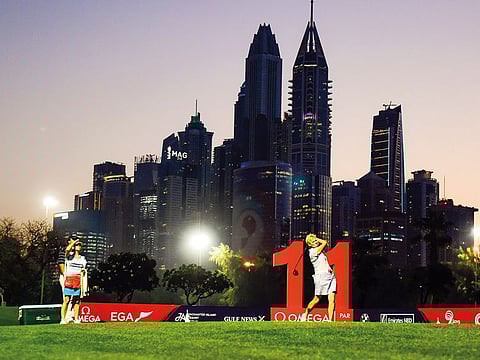 Trish Johnson tees off on hole 11 during the Omega Dubai Moonlight Classic.