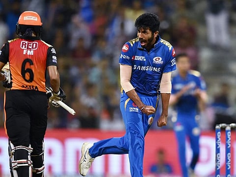 Mumbai’s Jasprit Bumrah celebrates the dismissal of Wriddhiman Saha during the IPL match against Sunrisers Hyderabad at Wankhede Stadium in Mumbai