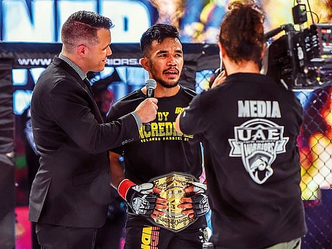 Rolando Dy speaks during an interview following his triumph over Kazakh’s Yerzhan Yestanov in Abu Dhabi.