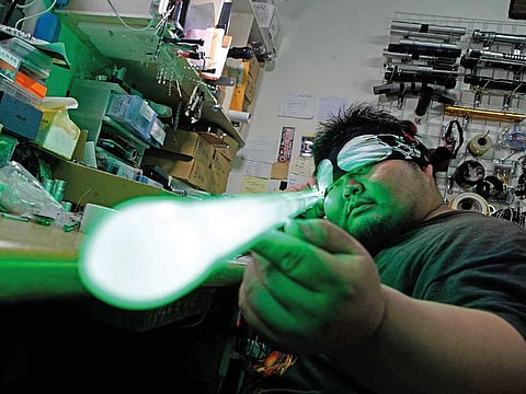 Makoto Tsai handcrafts lightsabers for Star Wars fans.