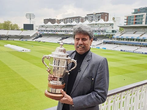 Kapil Dev poses at Lord's balcony with the World Cup
