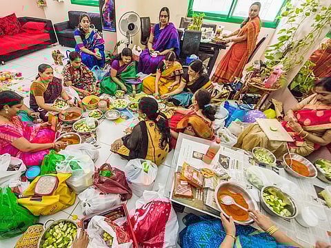 Women in the process of making world famous Andhra mango pickles.