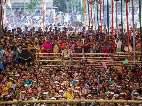 Supporters listen to West Benghal Chief Minister Mamata Banerjee, not pictured, during a campaign rally in Swarupnagar, West Bengal, India, on Monday, April 29, 2019.