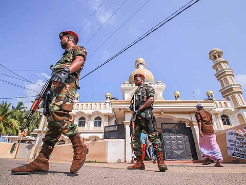 Sri Lankan military stand guard outside a mosque after clashes between two sectarian groups in a beach side resort in Poruthota village in Negombo, Sri Lanka May 6, 2019.