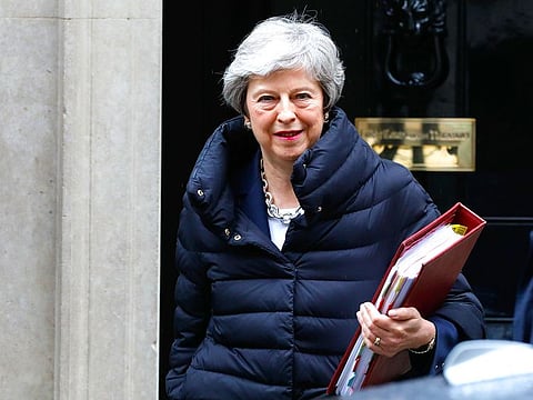 Theresa May, UK prime minister, departs number 10 Downing Street to attend a weekly questions and answers session in Parliament in London.