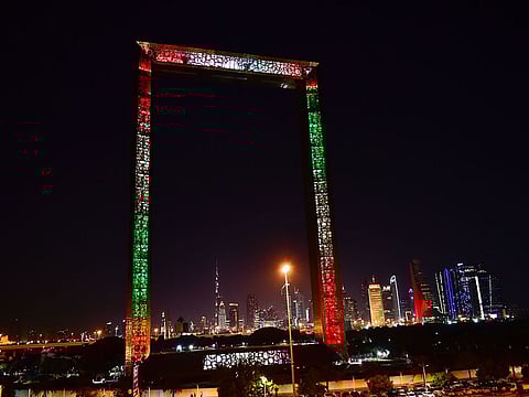 Dubai Frame in Zabeel park is illuminated in UAE flag colours.